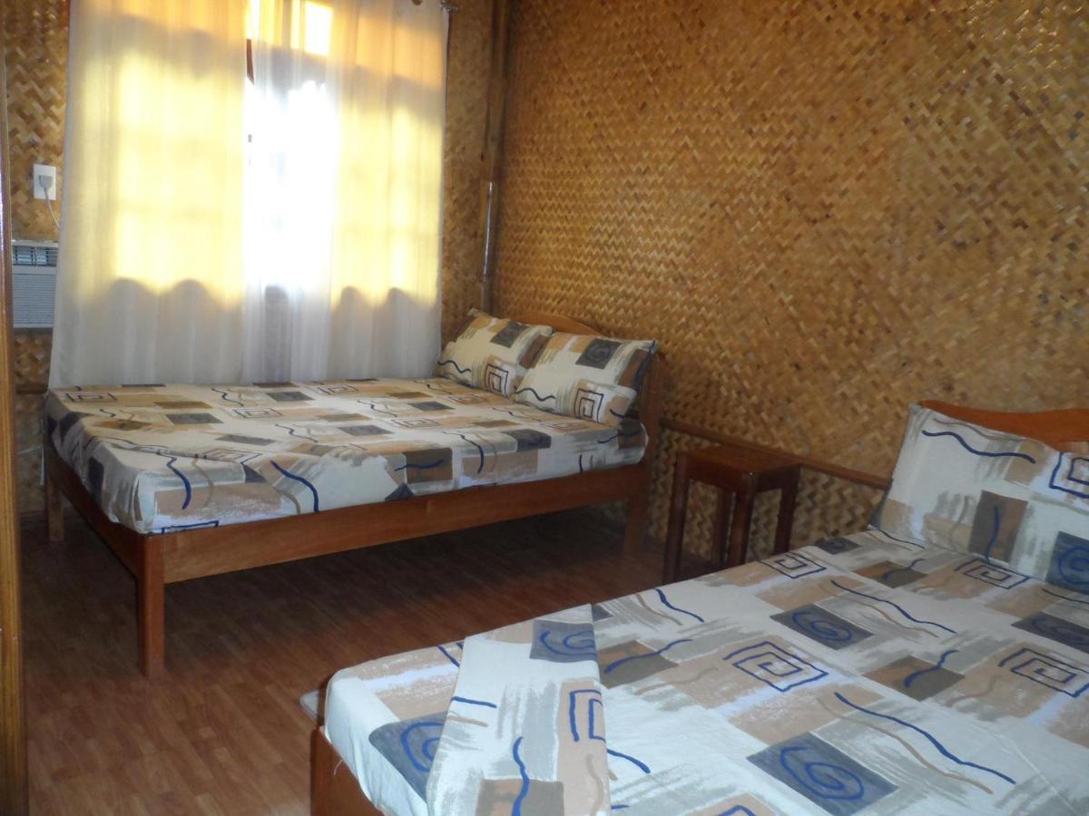 Victoria Guest House And Cottages Puerto Princesa Habitación foto